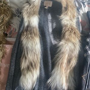 Skies are blue fur trimmed vest